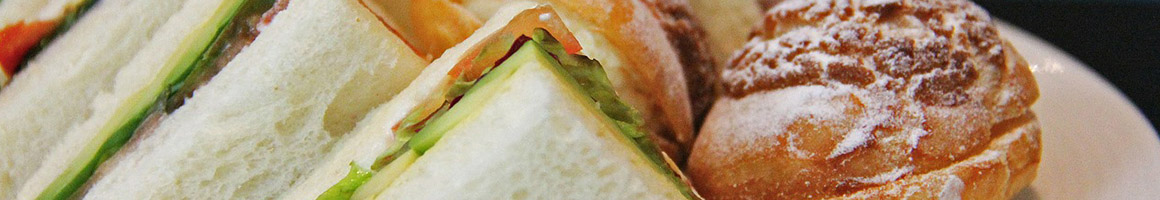Eating Breakfast & Brunch Sandwich at Sunshine Cafe restaurant in Santa Monica, CA.